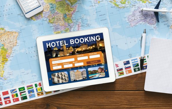 Tablet With Hotel Booking Application Lying On Desk, Collage, Above-View